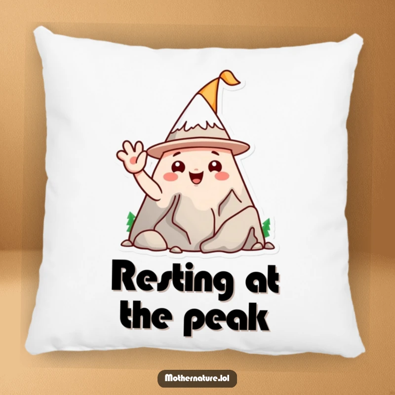 Funny mountain range character pillow, wearing a silly hat and waving, providing cozy humor and adventurous decor.