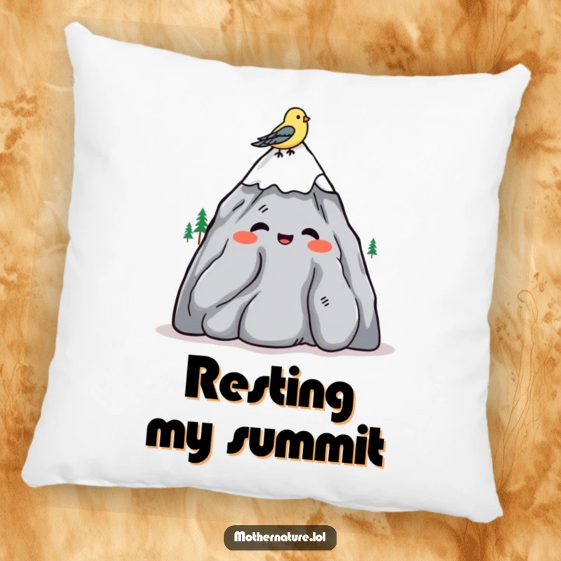 Funny pillow featuring a mountain character shrugging amiably, with a bird resting on its summit.