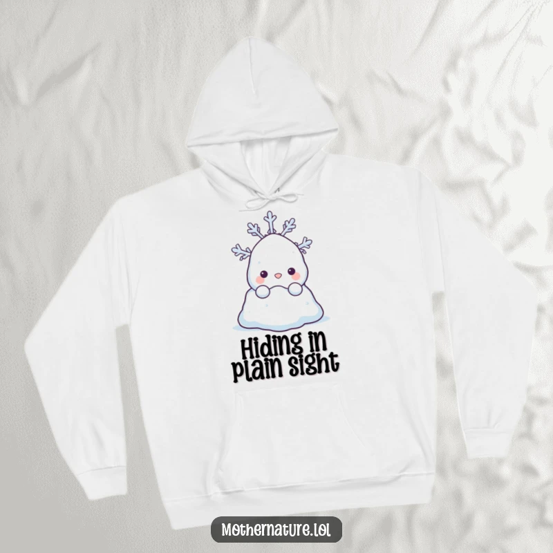 Funny hoodie with a shy snowdrift character peeking out from behind a happy snowflake. Warm and adorable.