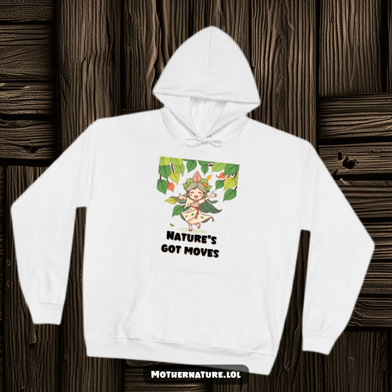 Funny Mother Nature hoodie showing a happy, dancing goddess immersed in a playful swirl of autumn leaves, radiating warmth and cheerfulness.