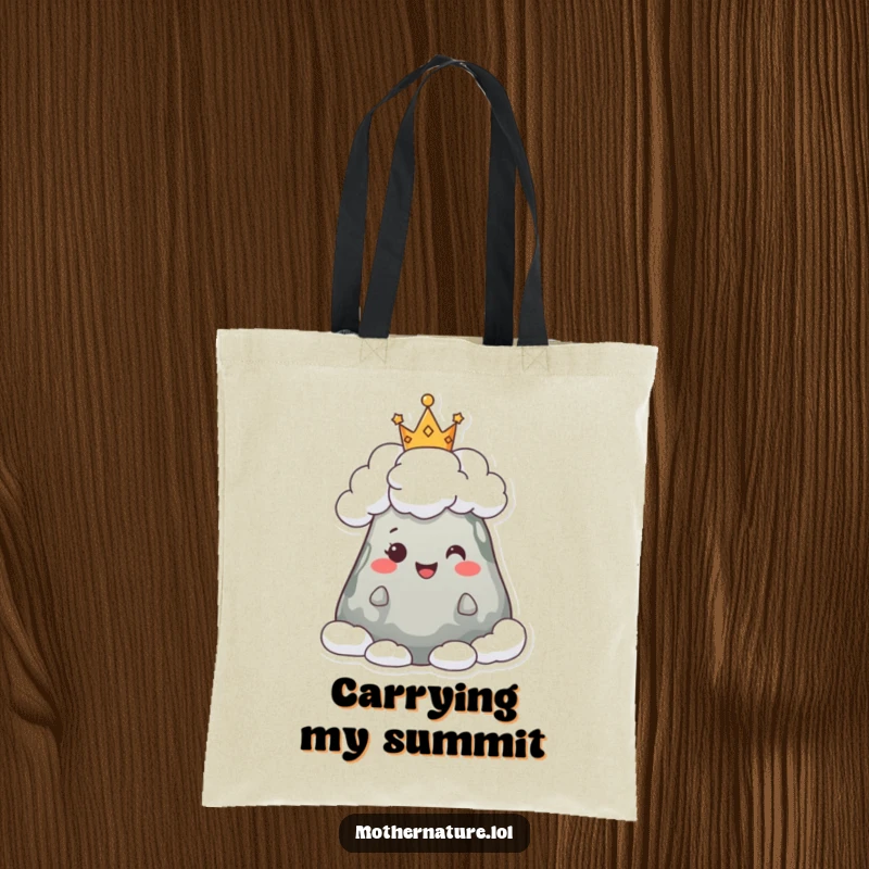 Funny tote bag showcasing a happy mountain character proudly wearing a crown of soft, fluffy clouds, perfect for carrying daily treasures.