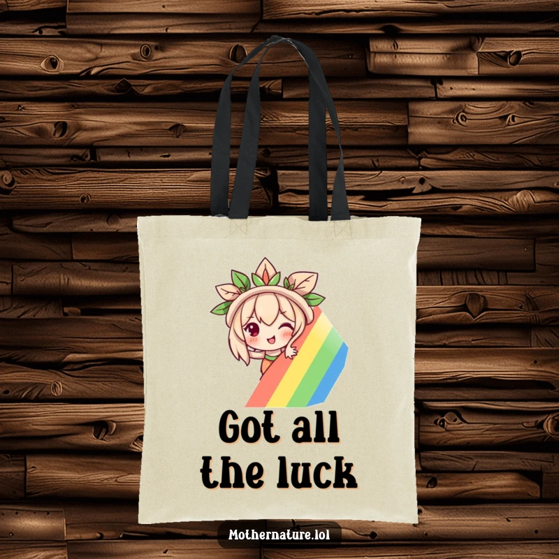 Funny Mother Nature tote bag with a mischievous character peeking from behind a vibrant rainbow, ideal for stylish and practical carrying.