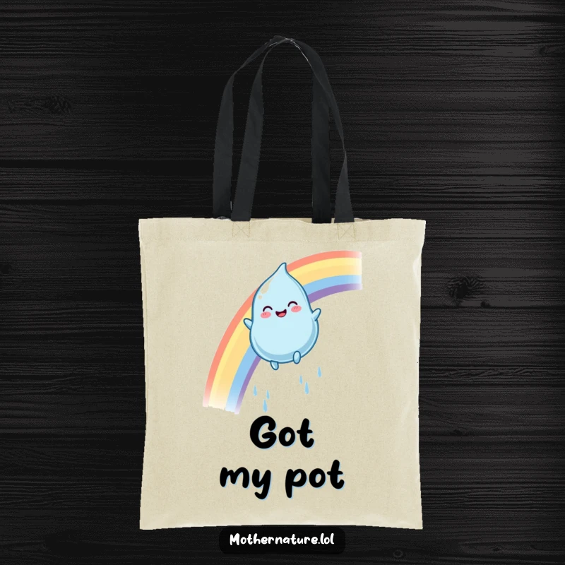 Funny rainbow raindrop tote bag with a smiling character gleefully sliding down a colorful arc, great for carrying essentials.